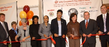October: Tim McCormick, Kimberly Duchossois, Dayle Duchossois Fortino, Ald. Sharon Denise Dixon, Senator Jacqueline Collins, Alderman Latasha Thomas, Lynn Kiley, Mayor Daley, and Ted Weldon joined in a ribbon cutting ceremony at SOS Children’s Village.